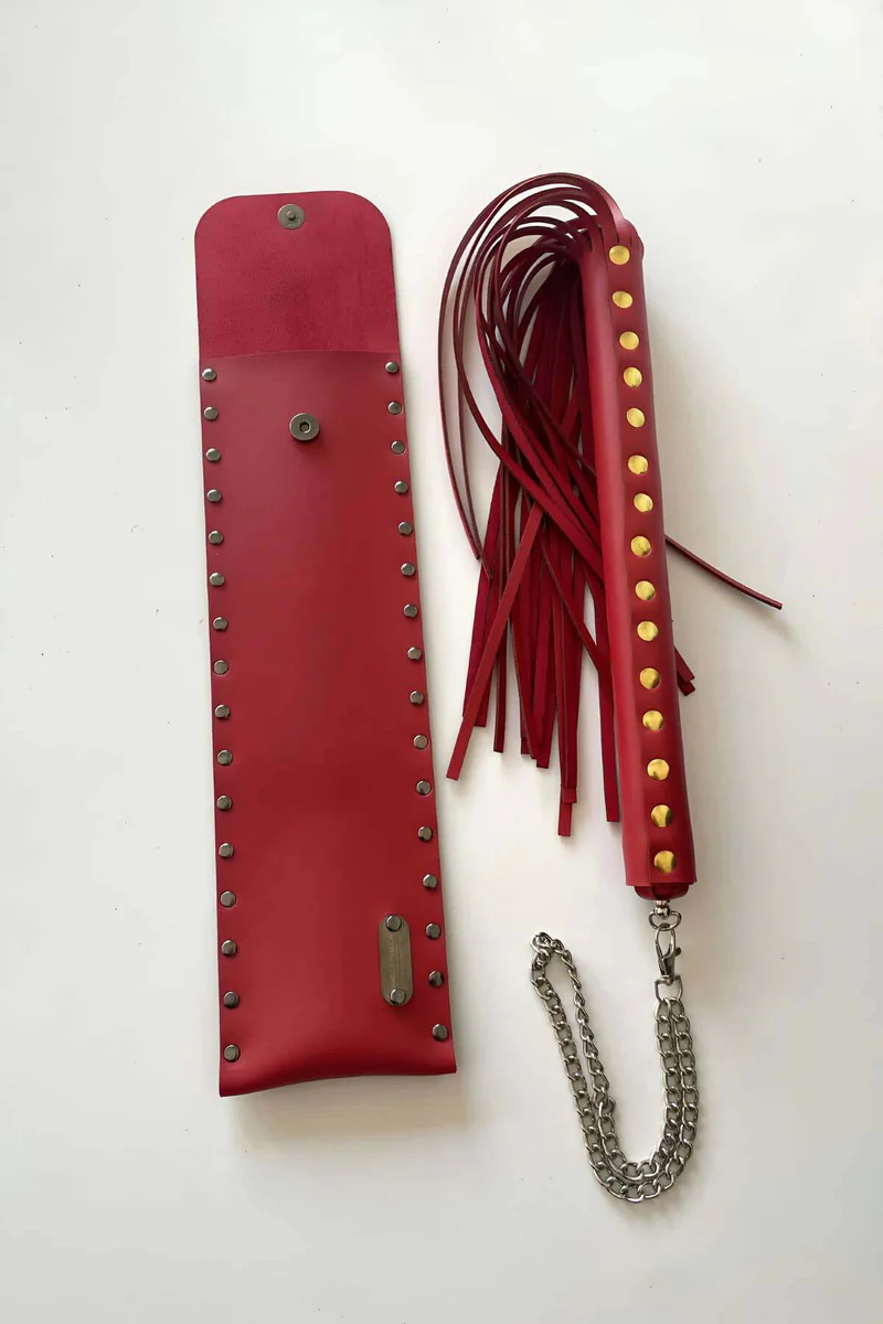 Red faux leather flogger with attached