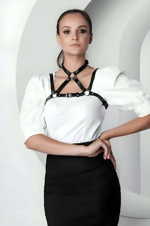 Black Faux Leather Chest Harness with Choker and O-Ring Detail on Woman