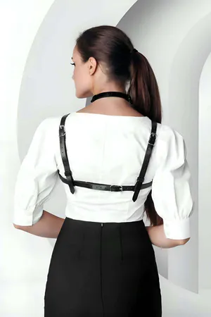Black Faux Leather Chest Harness with Choker and O-Ring Detail on Woman