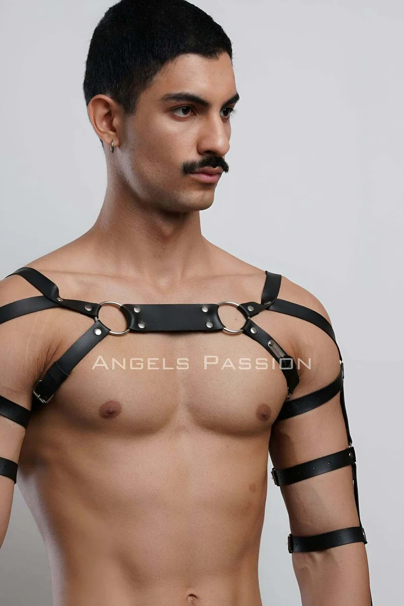 Black fashion harness worn over torso highlighting