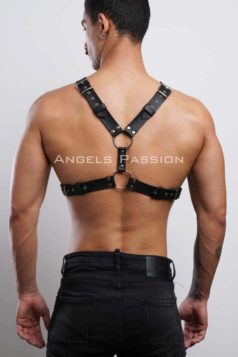 Black studded chest harness with O-ring accents from back