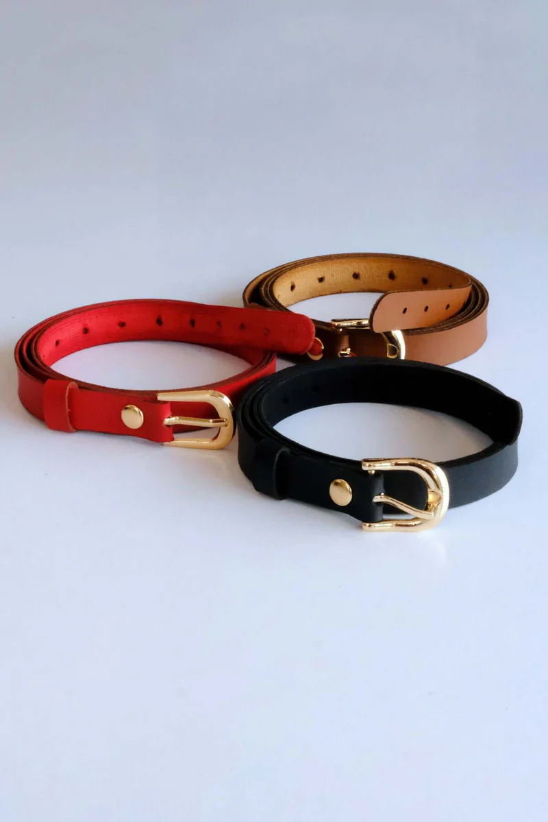 Red faux leather cinch belt with