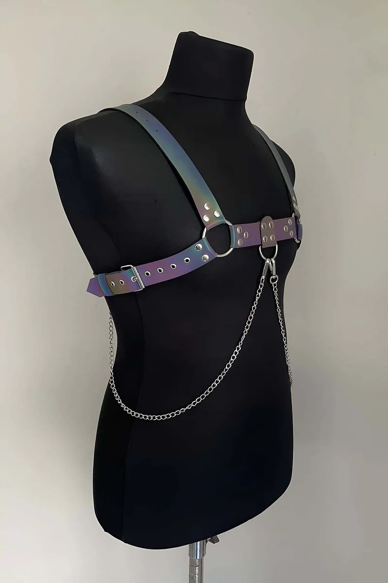 Rainbow iridescent body harness with silver chain detail on mannequin
