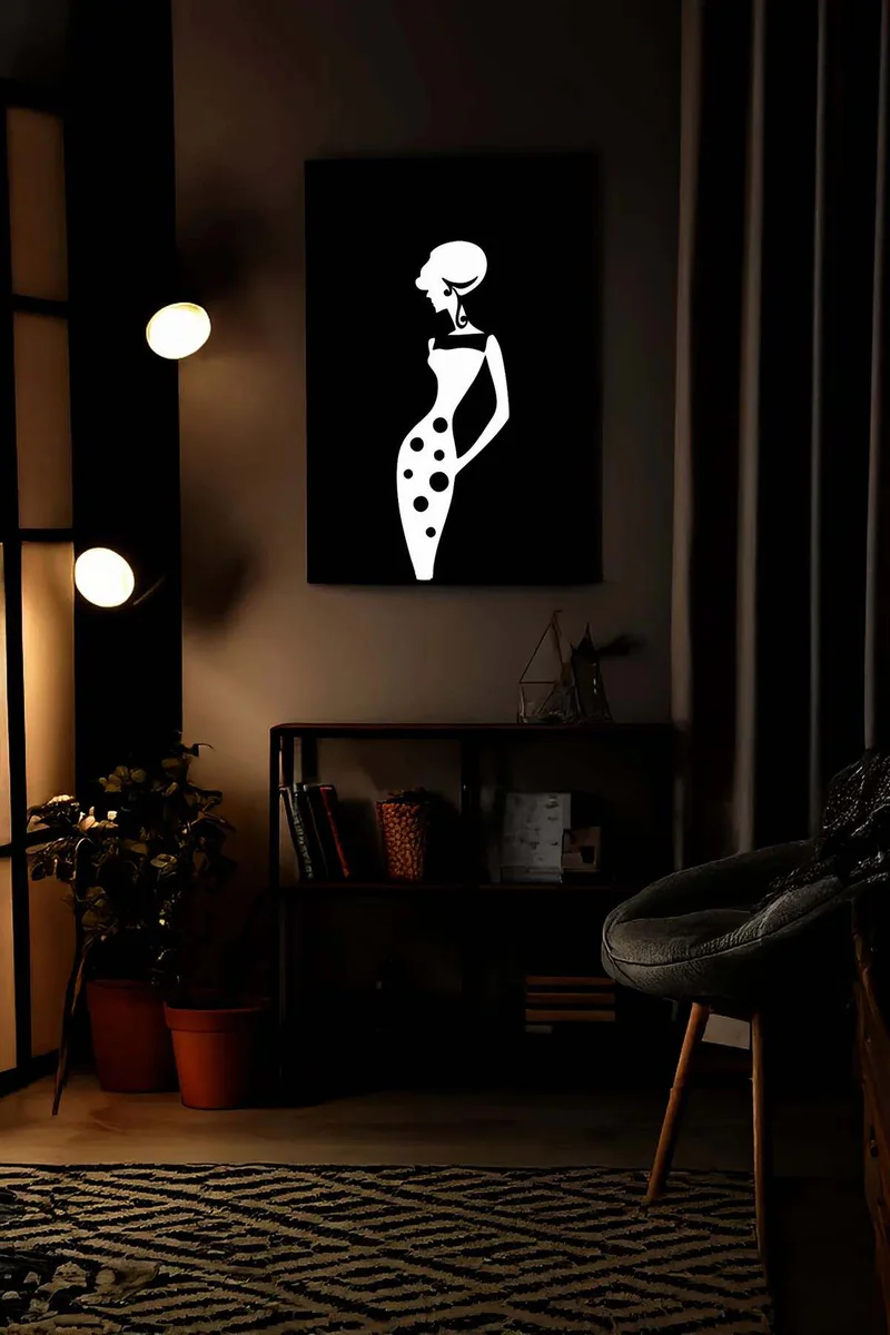 Black and white decorative wall art with a