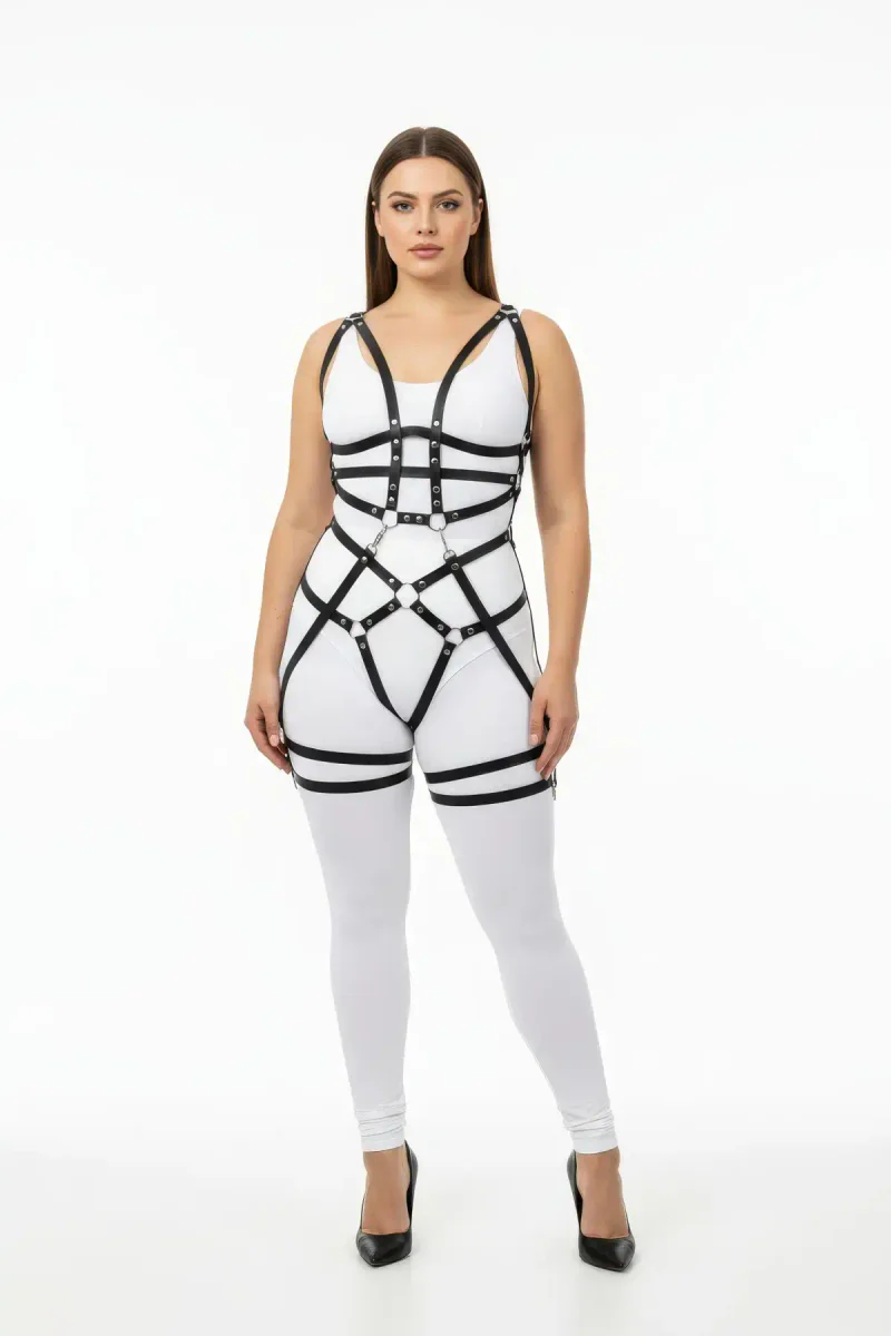 Black Faux Leather Full Body Harness with Intersecting O-Rings, worn by a plus-size model on a white background, highlighting