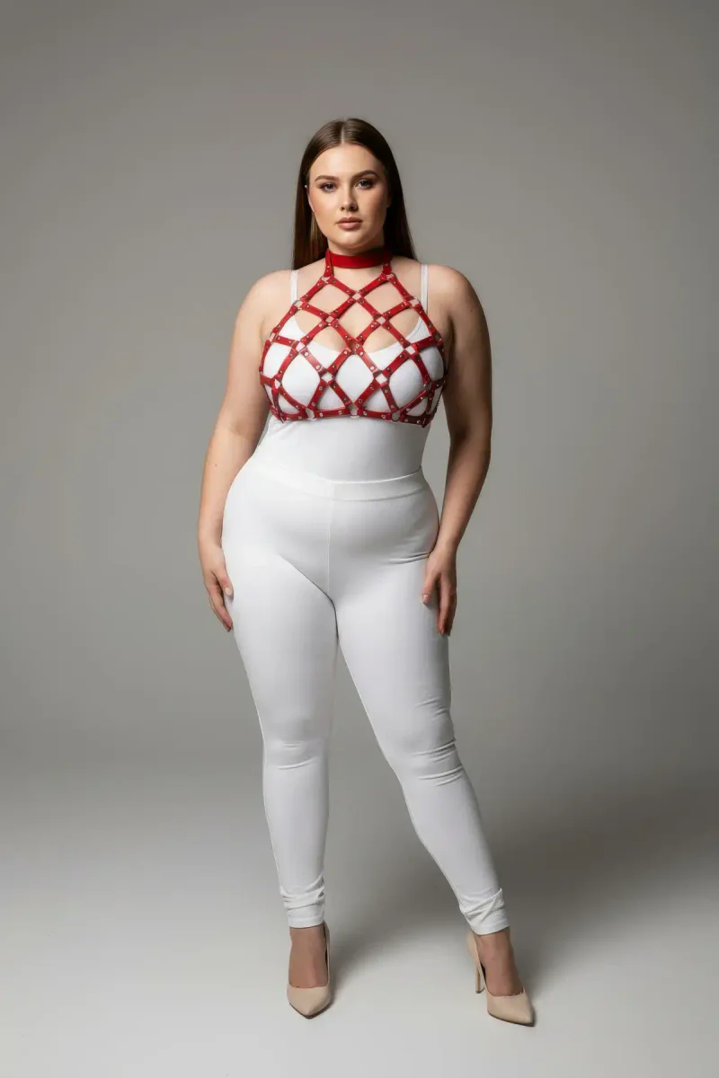 Red geometric cage halter harness with allover sparkle detail worn by model